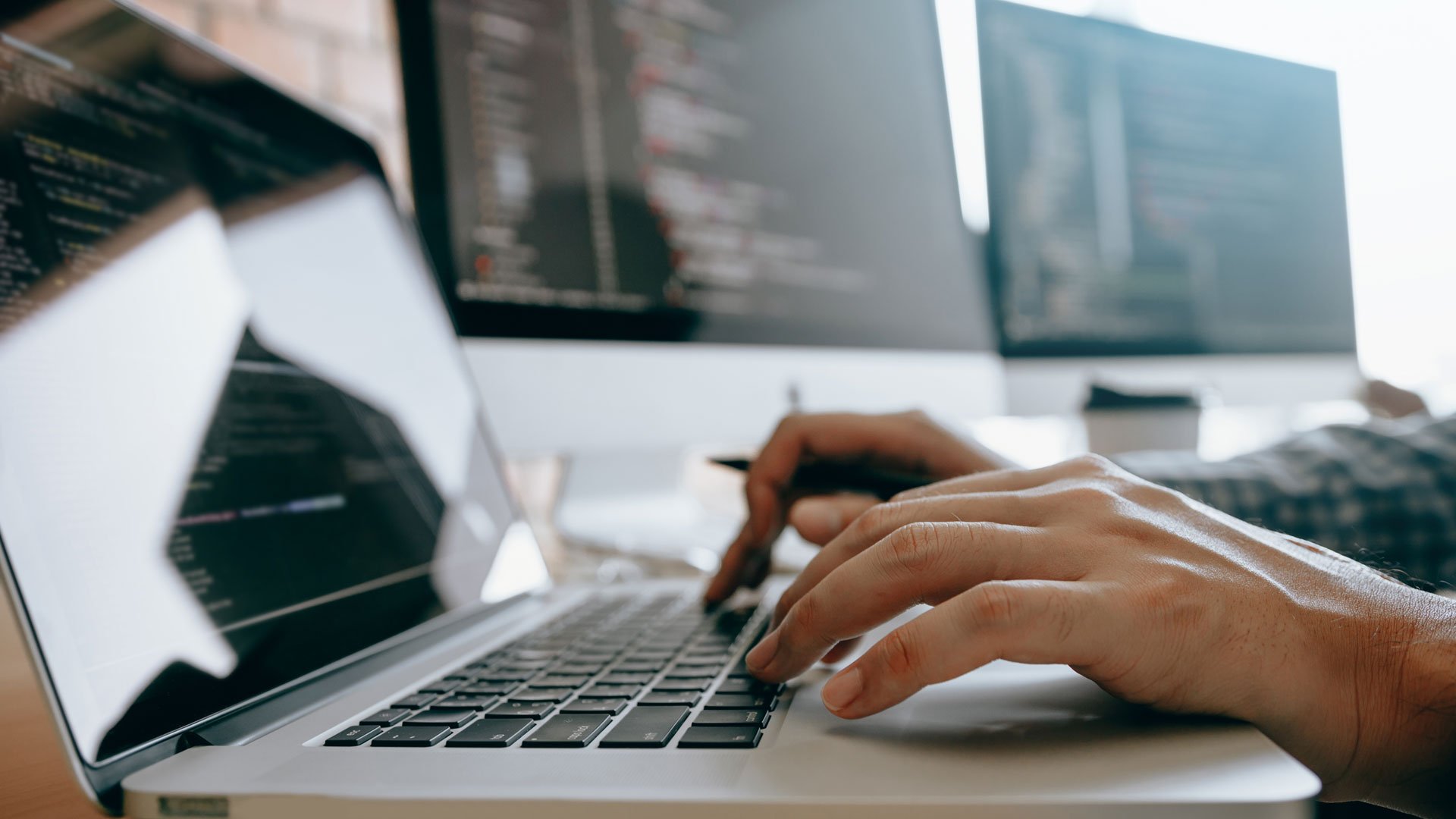 contemporary-website-developer-man-typing